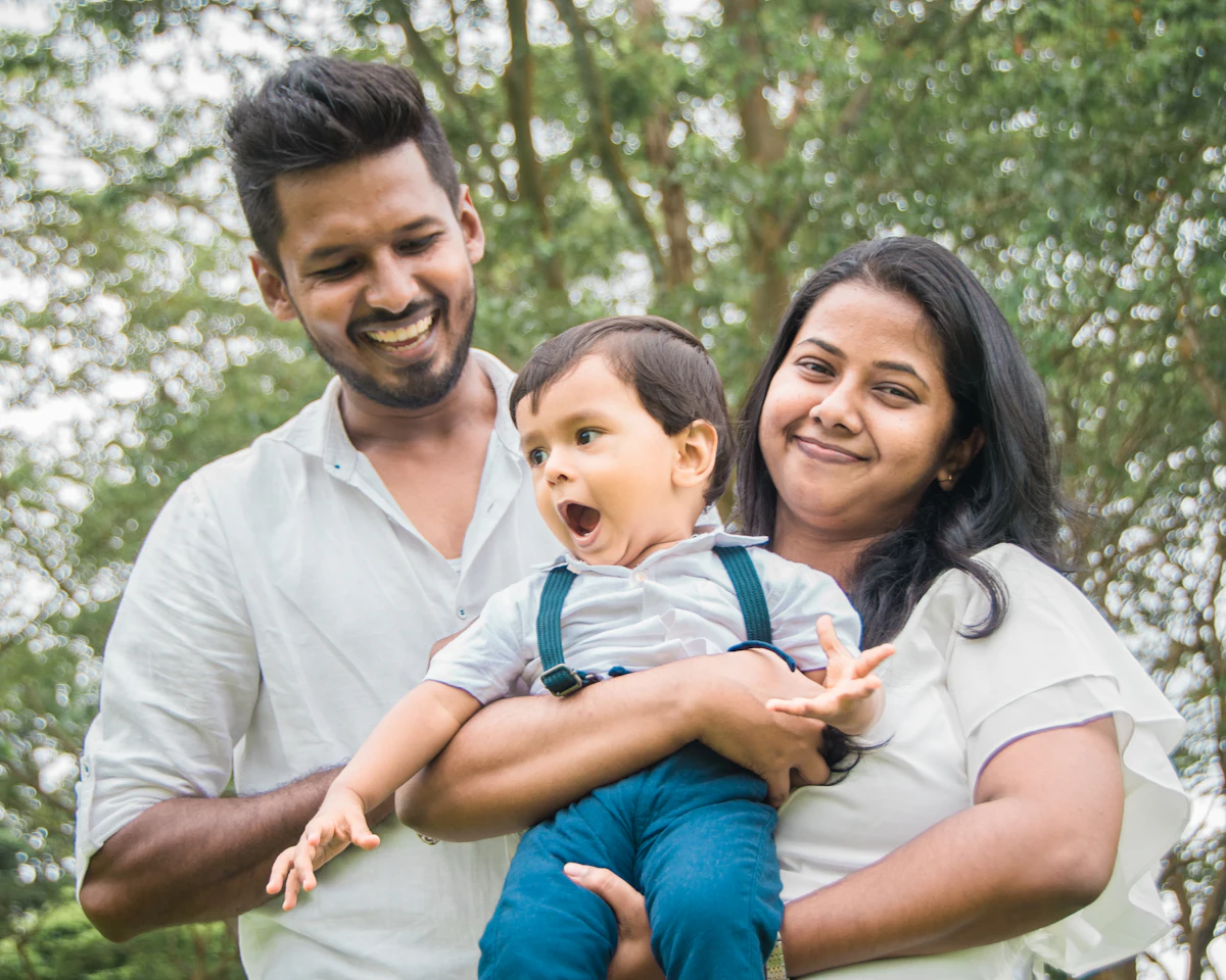 A mother and father with their baby