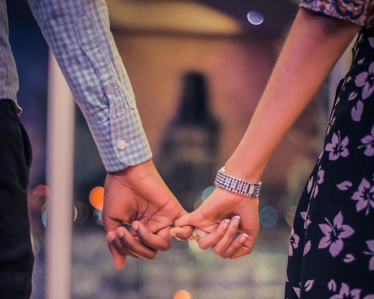 A husband and wife holding hands