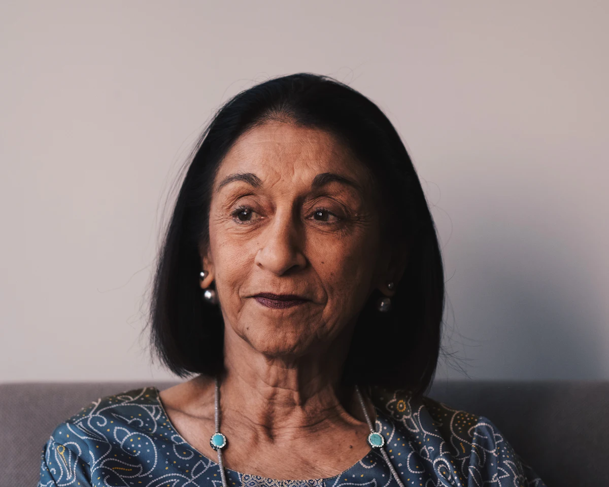 A smiling woman in her fifties